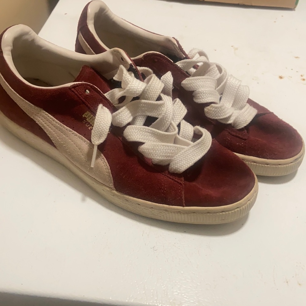 Maroon suede pumas